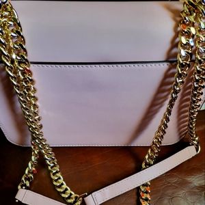 Brand new pale pink Michael Kors purse. Medium size